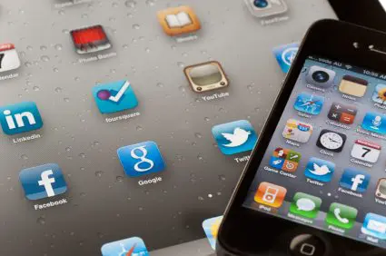 IPad and Iphone both showing home screens