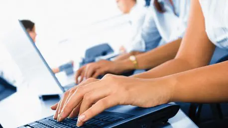 Young friendly female helpdesk operator