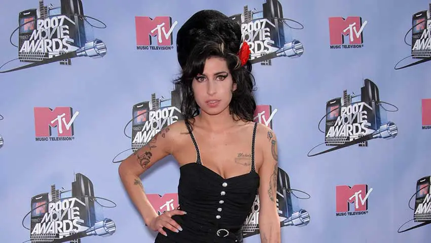 The UK music industry has initiated its first legal action against AI "deepfake" technology, targeting a start-up that produces songs emulating the voices of renowned musicians like Amy Winehouse, Rihanna, and Drake.