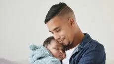 The lack of paid paternity leave for self-employed fathers is leaving families facing what campaigners describe as an “impossible choice” between bonding with a newborn child and maintaining an income, as the government begins a long-awaited review of parental leave and pay.