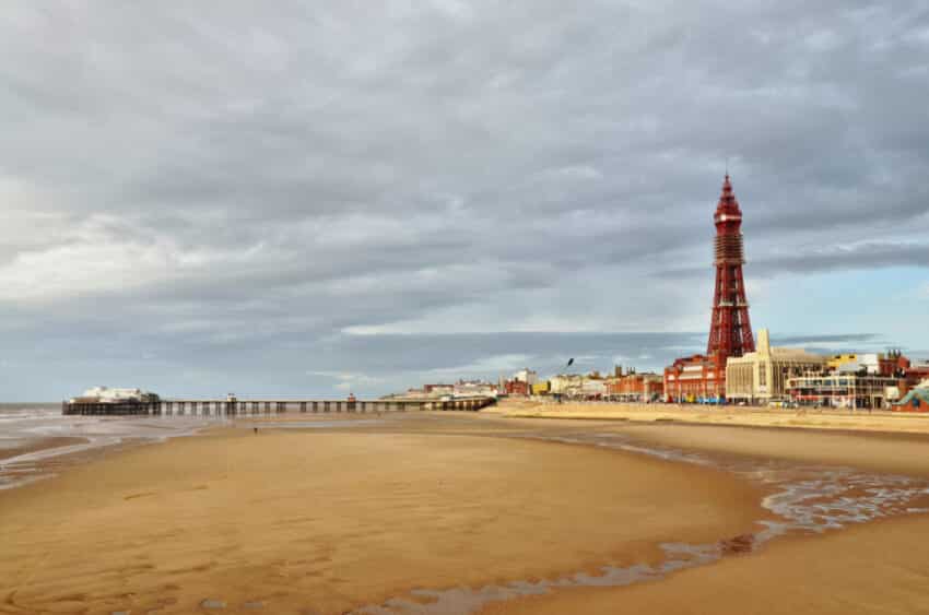 Blackpool Tower and pier, viewed across the sands.