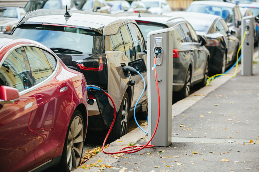 The UK government has cut grants for electric vehicles for the second time in a year, provoking the anger of the car industry and prompting a call for car tax to be redesigned.