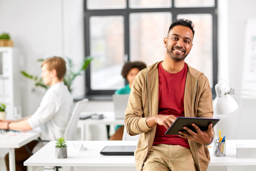 Business,,Technology,And,People,Concept,-,Happy,Smiling,Indian,Man