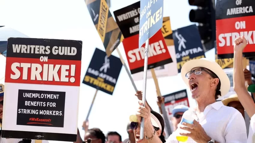 Screenwriters in the US say they have reached a tentative deal with studio bosses that could see them end a strike that has lasted nearly five months.